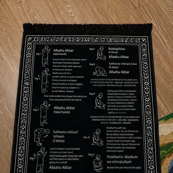 Customer using the Step-by-Step Salah mat