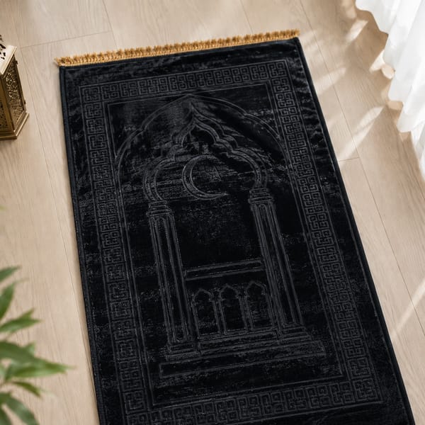 Customer using the prayer mat