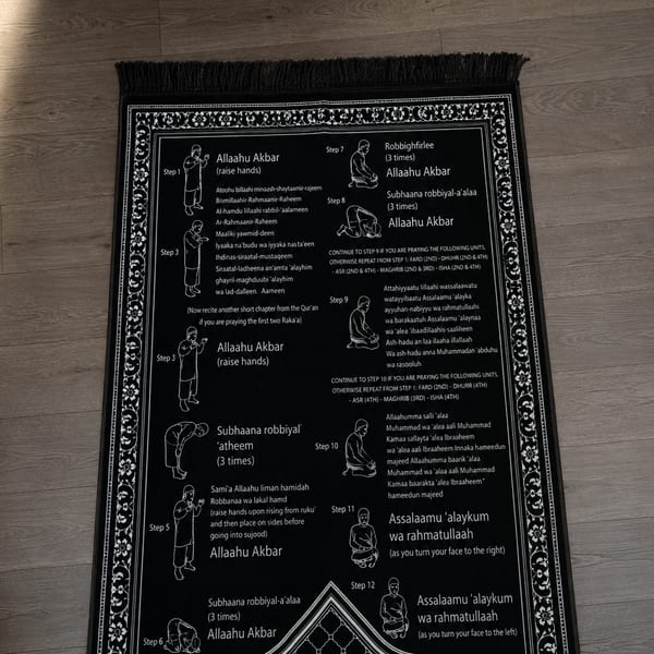 Customer using the Step-by-Step Salah mat