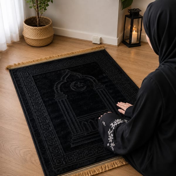 Customer using the prayer mat